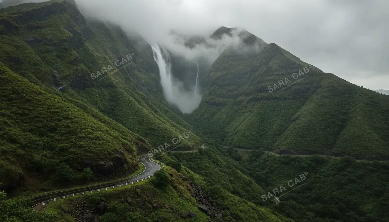 The Western Ghats near Sakleshpur in heavy monsoon, cloud pouring over the ridges